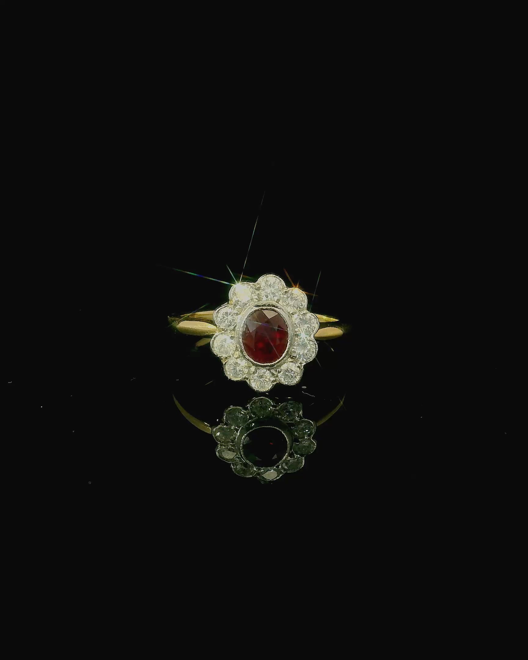 yellow gold ring with oval cut ruby and diamond cluster. gold diamond ring. luxury jewellery in kent. west malling. borough green jewellers